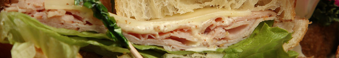 Eating Deli Sandwich at Avenue Deli restaurant in New Providence, NJ.